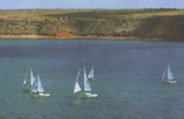 Photograph showing sailboats on Lake Meredith.