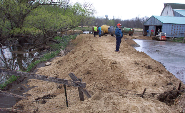 Figure 6. Response activities showing Mill Creek. Photograph by Walter Haas, Minnesota Pollution Control Agency, 2004.